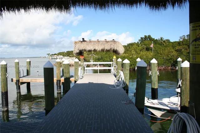 a balcony with chairs