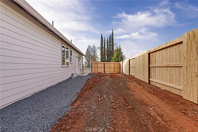 a view of a street with a building in the background