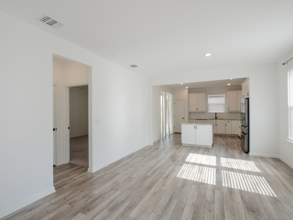 103 Kitty Hawk Road Georgetown, TX 78633 - Photo 10 of 34 a living room with a couch and a view of kitchen