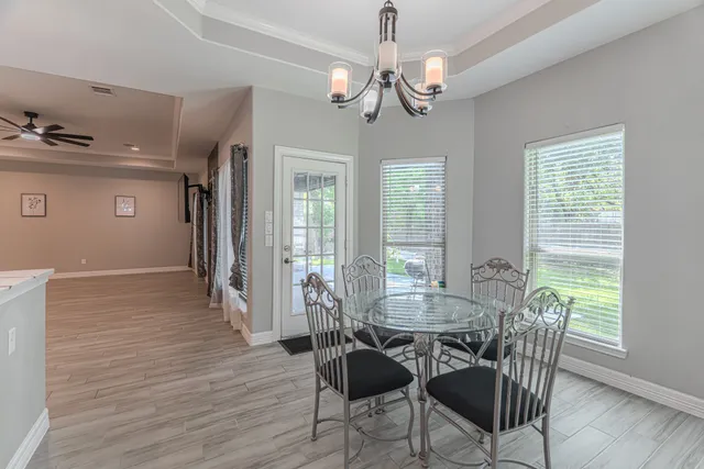 a utility room with sink dryer and washer