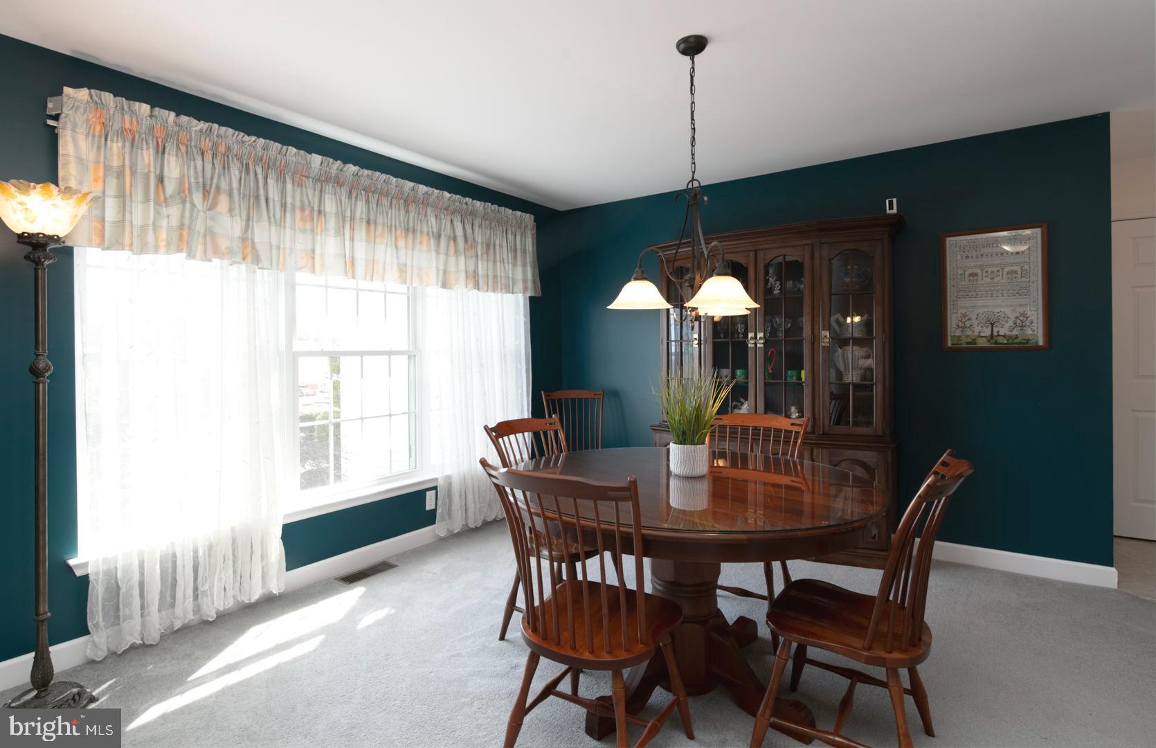 382 Tilden Road Mohrsville, PA 19541 - Photo 11 of 34 a dining room with furniture window and chandelier