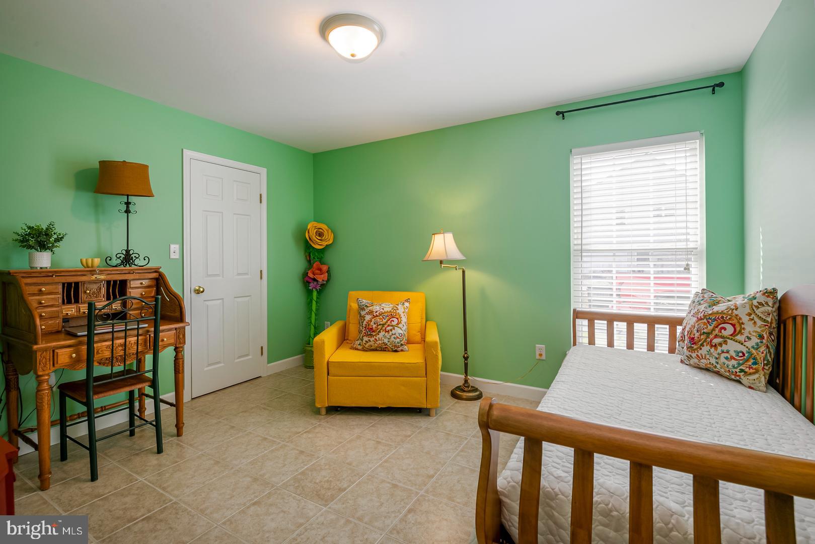 382 Tilden Road Mohrsville, PA 19541 - Photo 24 of 34 a bedroom with a bed and a chair