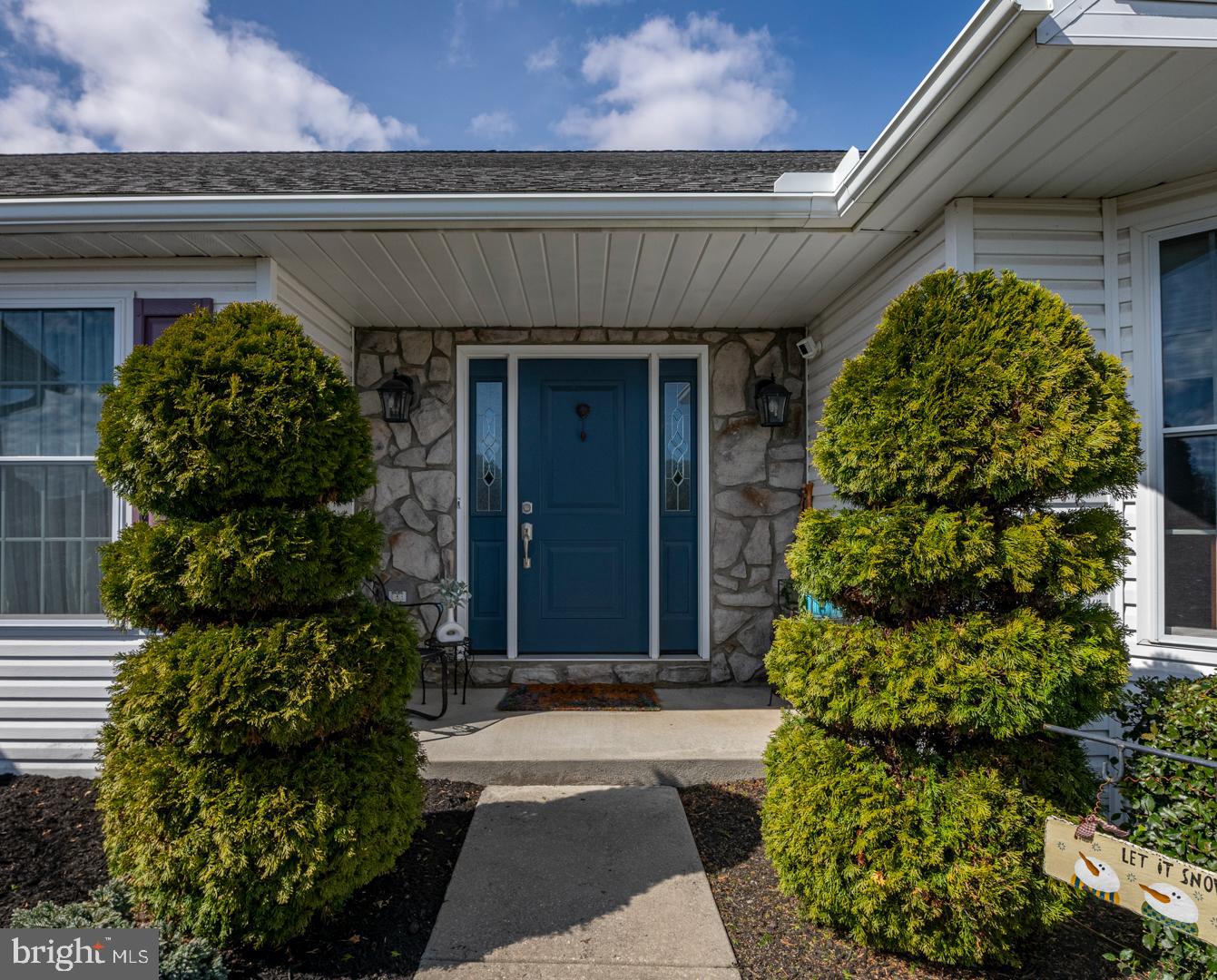 382 Tilden Road Mohrsville, PA 19541 - Photo 4 of 34 a front view of a house with garden