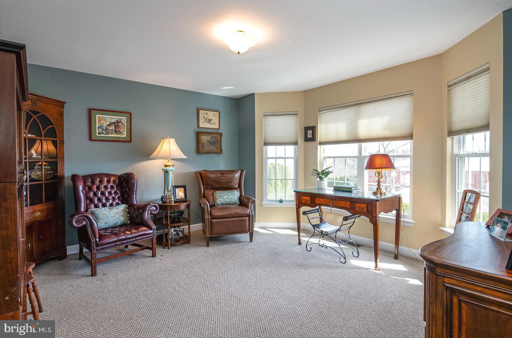382 Tilden Road Mohrsville, PA 19541 - Photo 5 of 34 a living room with furniture and a dining table next to a window