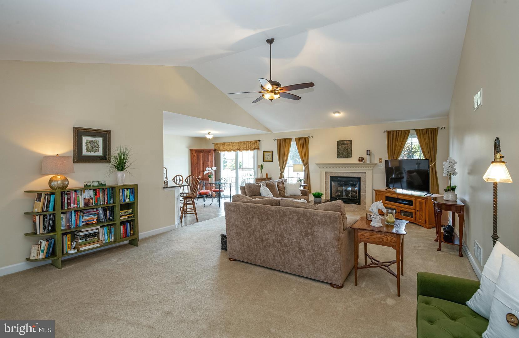 382 Tilden Road Mohrsville, PA 19541 - Photo 7 of 34 a living room with furniture a fireplace and a chandelier