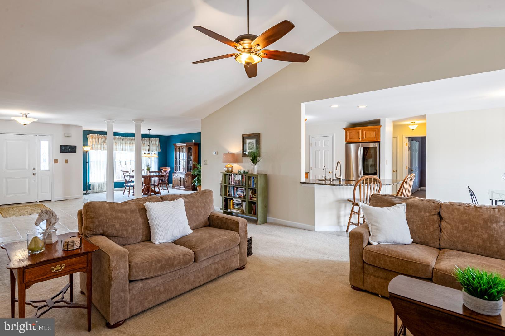 382 Tilden Road Mohrsville, PA 19541 - Photo 10 of 34 a view of a living room a livingroom with furniture and a chandelier fan
