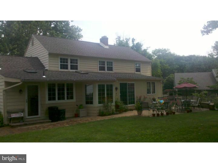 129 Kitty Hawk Road Cherry Hill, NJ 08034 - Photo 6 of 12 a black and white photo of a house
