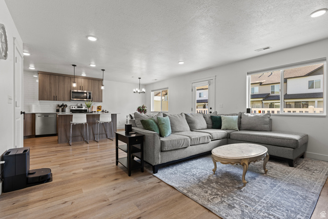 3097 Old Emigrant Road, Unit A Syracuse, UT 84075 - Photo 4 of 27 Family Room