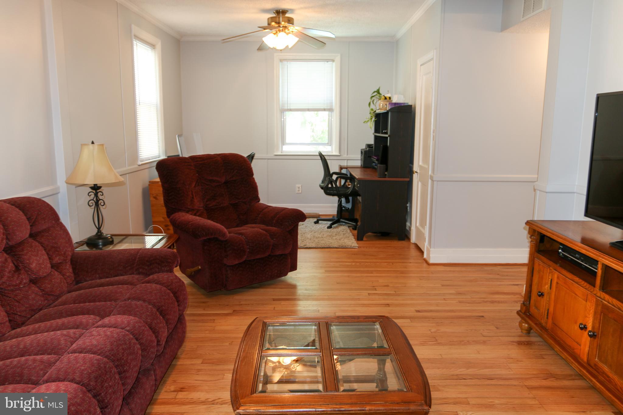 5517 Ashbourne Road Halethorpe, MD 21227 - Photo 7 of 38 Living Room with hardwood floors