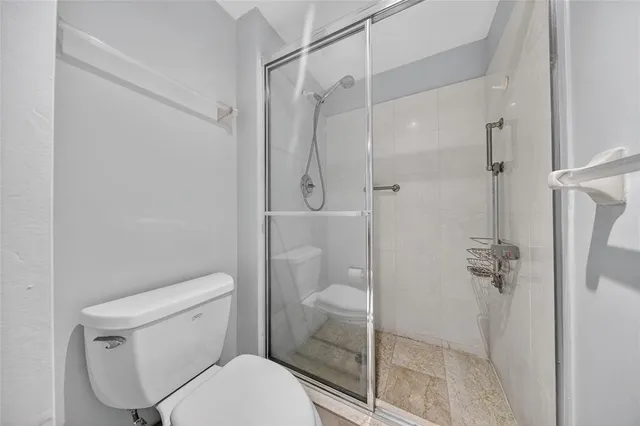a bathroom with a bathtub sink and mirror