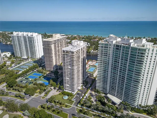 a view of a city with tall buildings