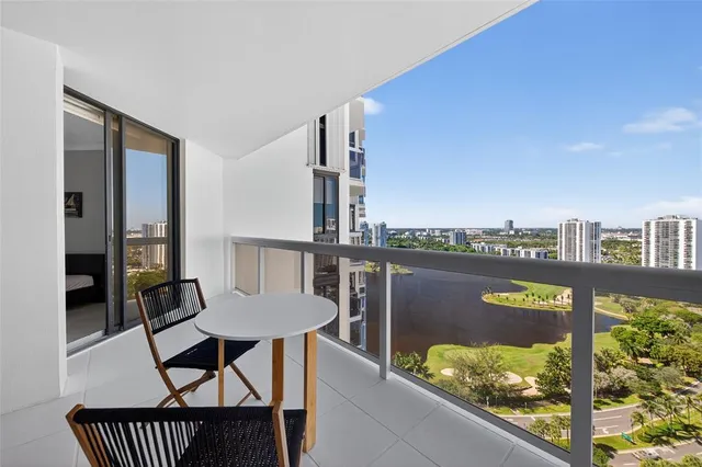 a view of balcony with outdoor seating