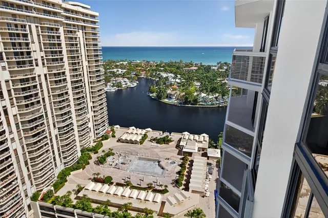 a view of a city with tall buildings