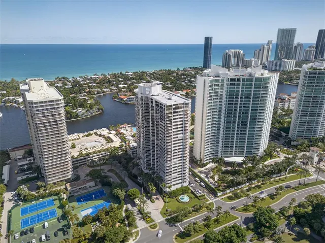 a view of a city with tall buildings