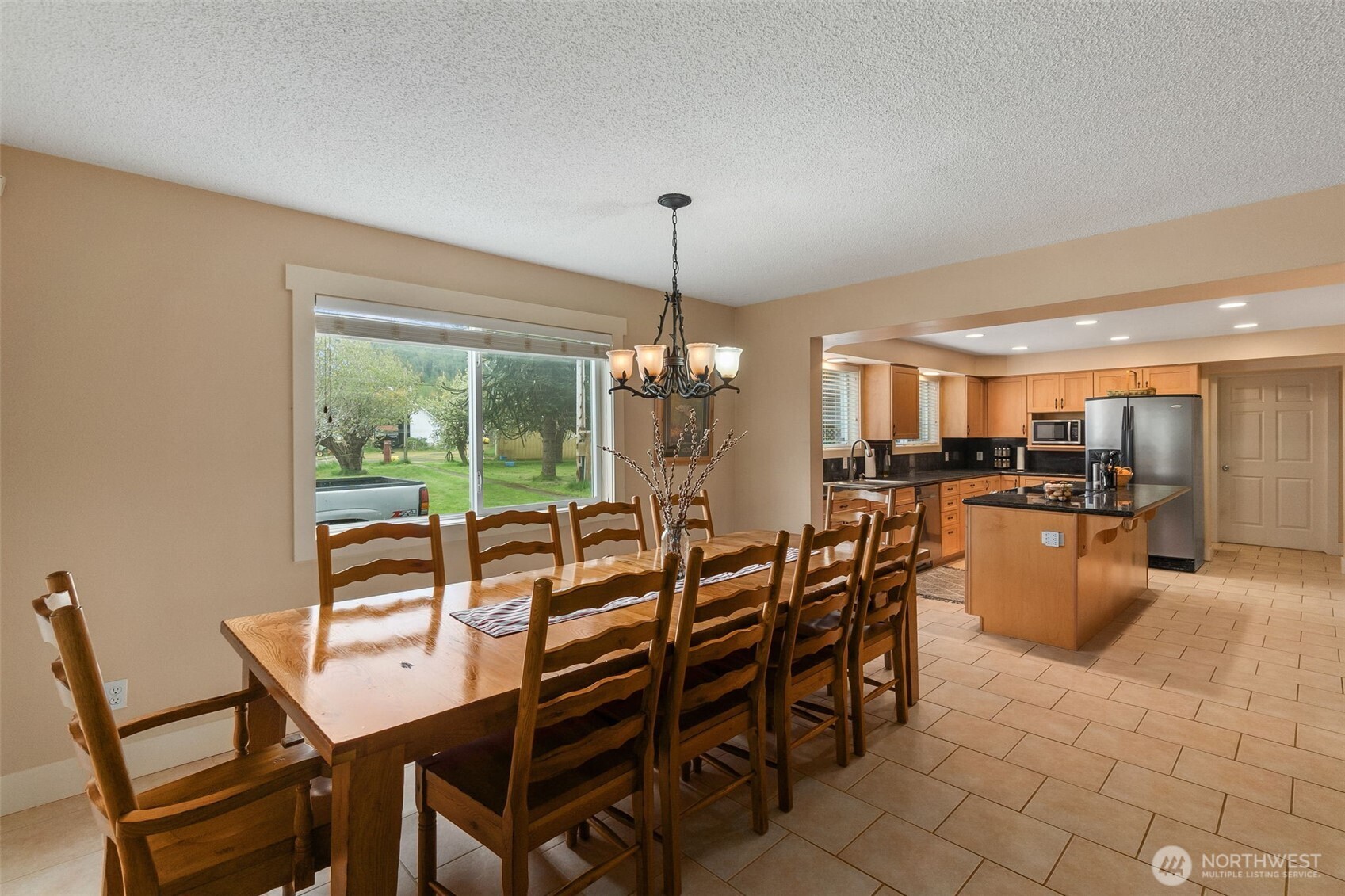 912 Middle Satsop Road Montesano, WA 98563 - Photo 23 of 36 a view of a dining room with furniture window and outside view