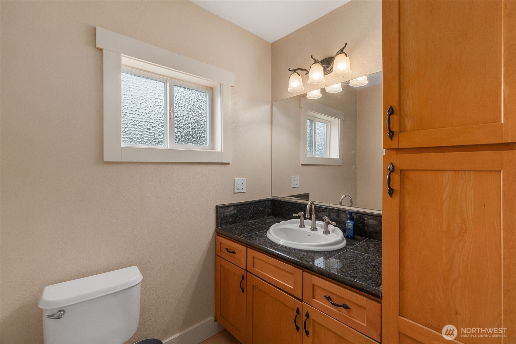 912 Middle Satsop Road Montesano, WA 98563 - Photo 29 of 36 a bathroom with a sink vanity and a mirror
