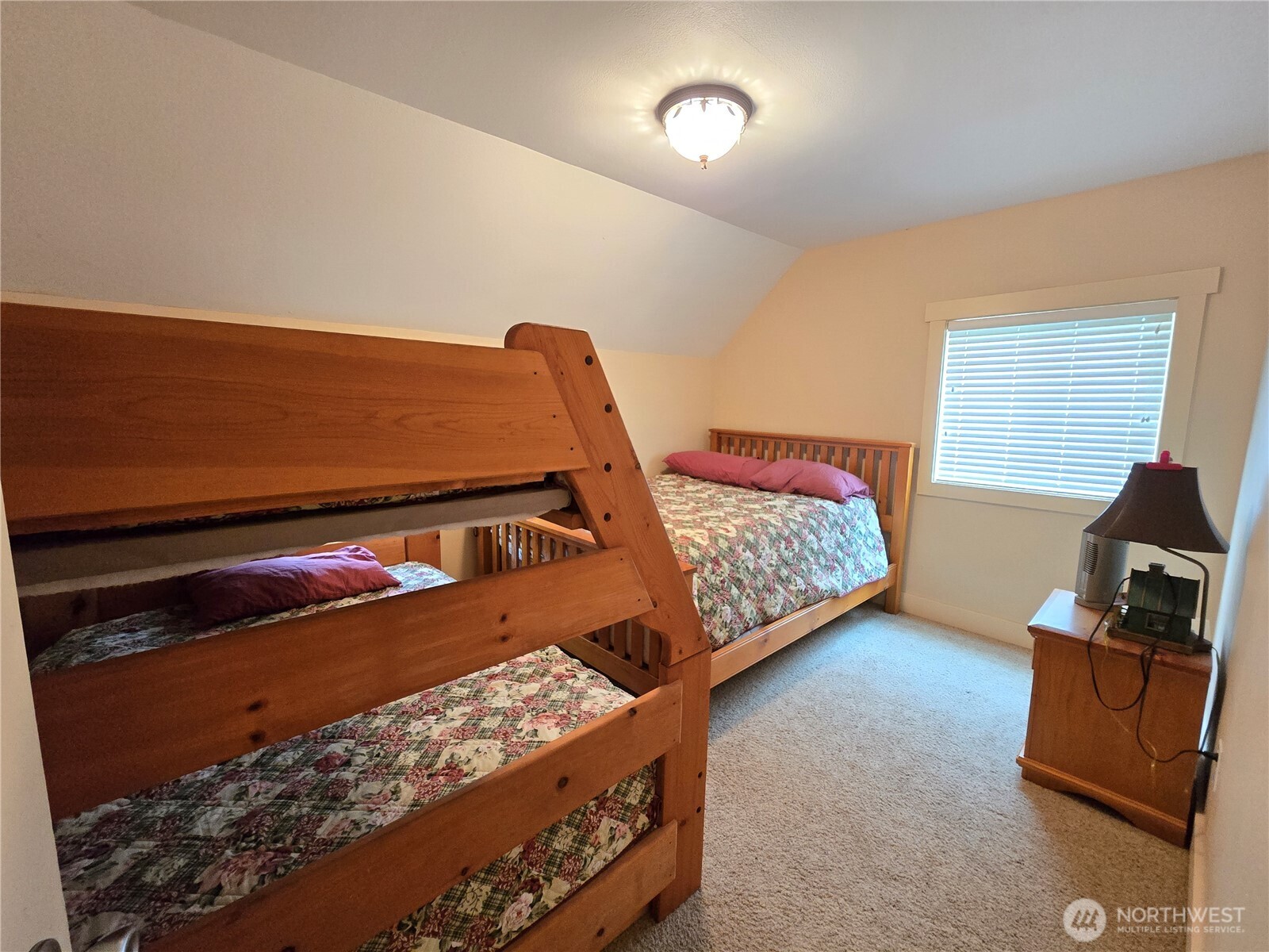 912 Middle Satsop Road Montesano, WA 98563 - Photo 33 of 36 a bedroom with bed and a window