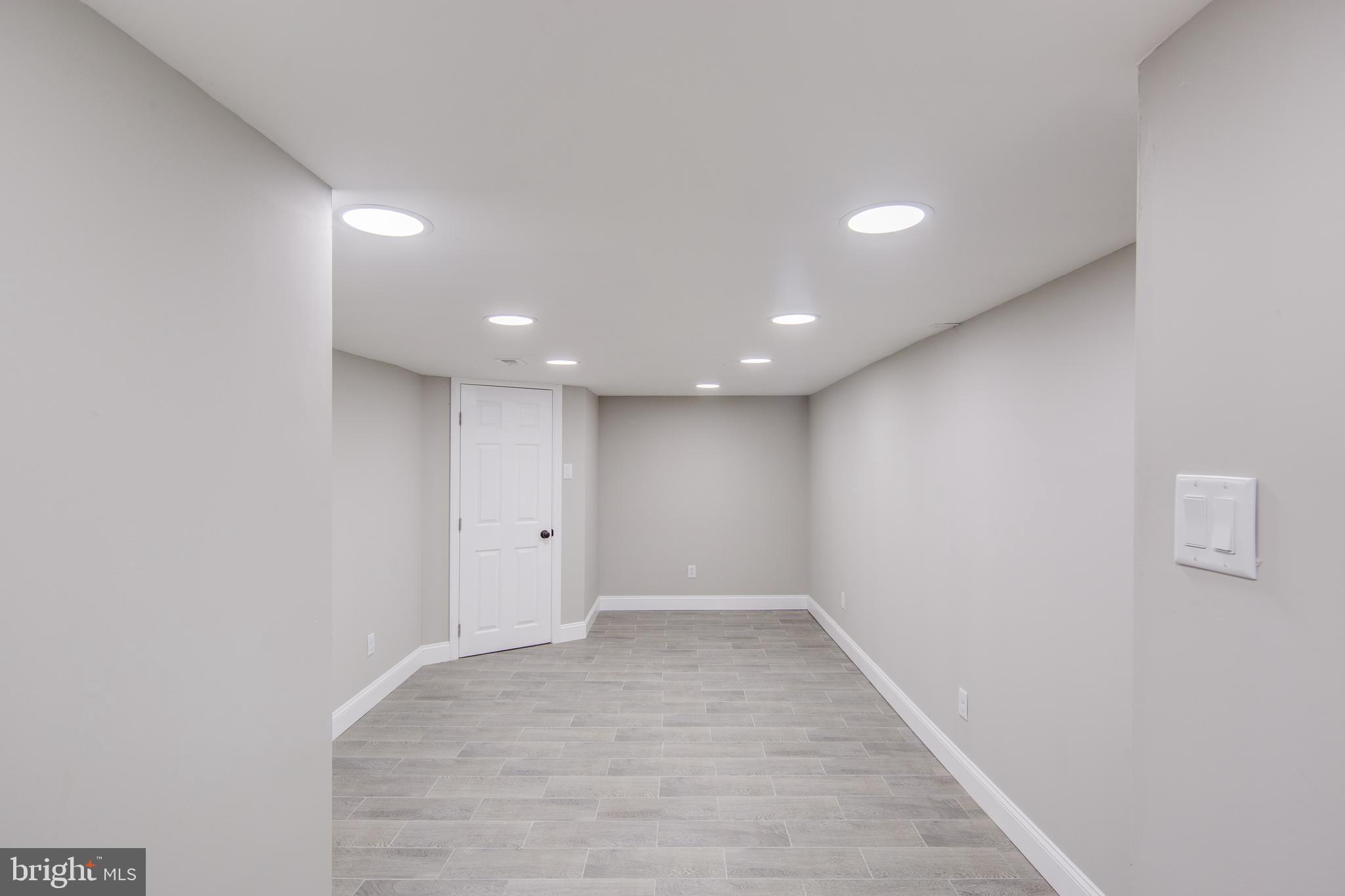 2116 Tasker Street Philadelphia, PA 19145 - Photo 19 of 22 Finished Basement