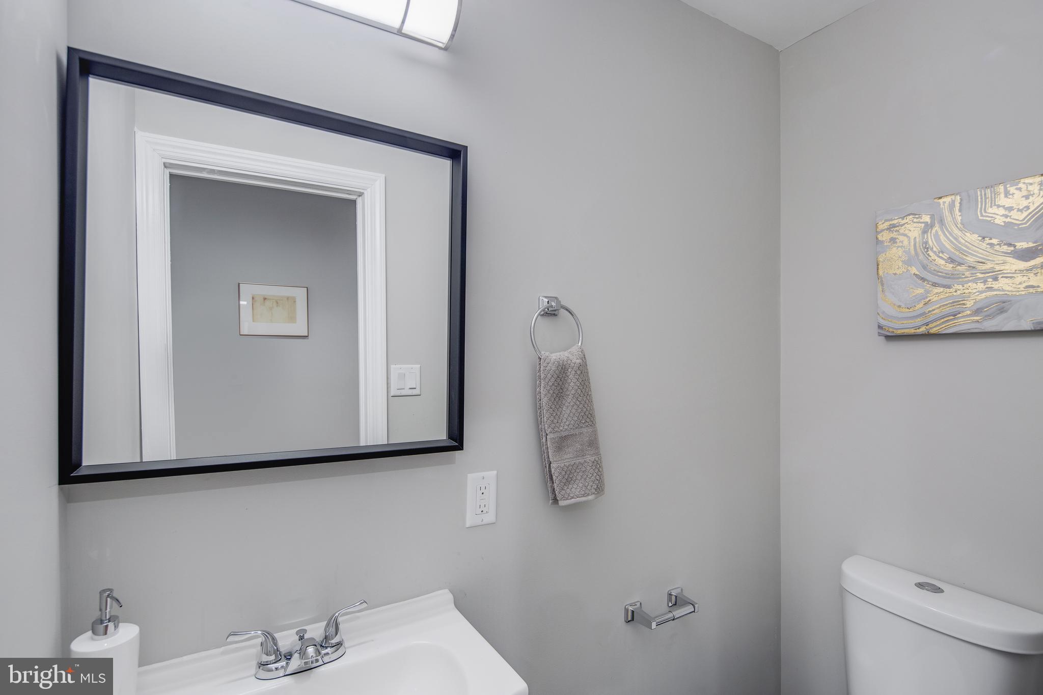 2116 Tasker Street Philadelphia, PA 19145 - Photo 10 of 22 Main Floor Half Bath