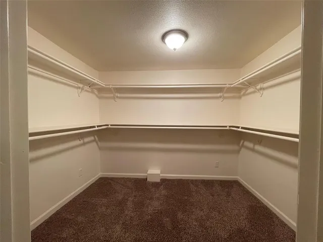 a empty closet with white paint