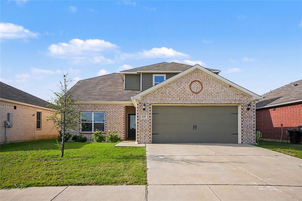 125 Sammy Venus, TX 76084 - Photo 1 of 39 Brick facade exterior with a two-car garage