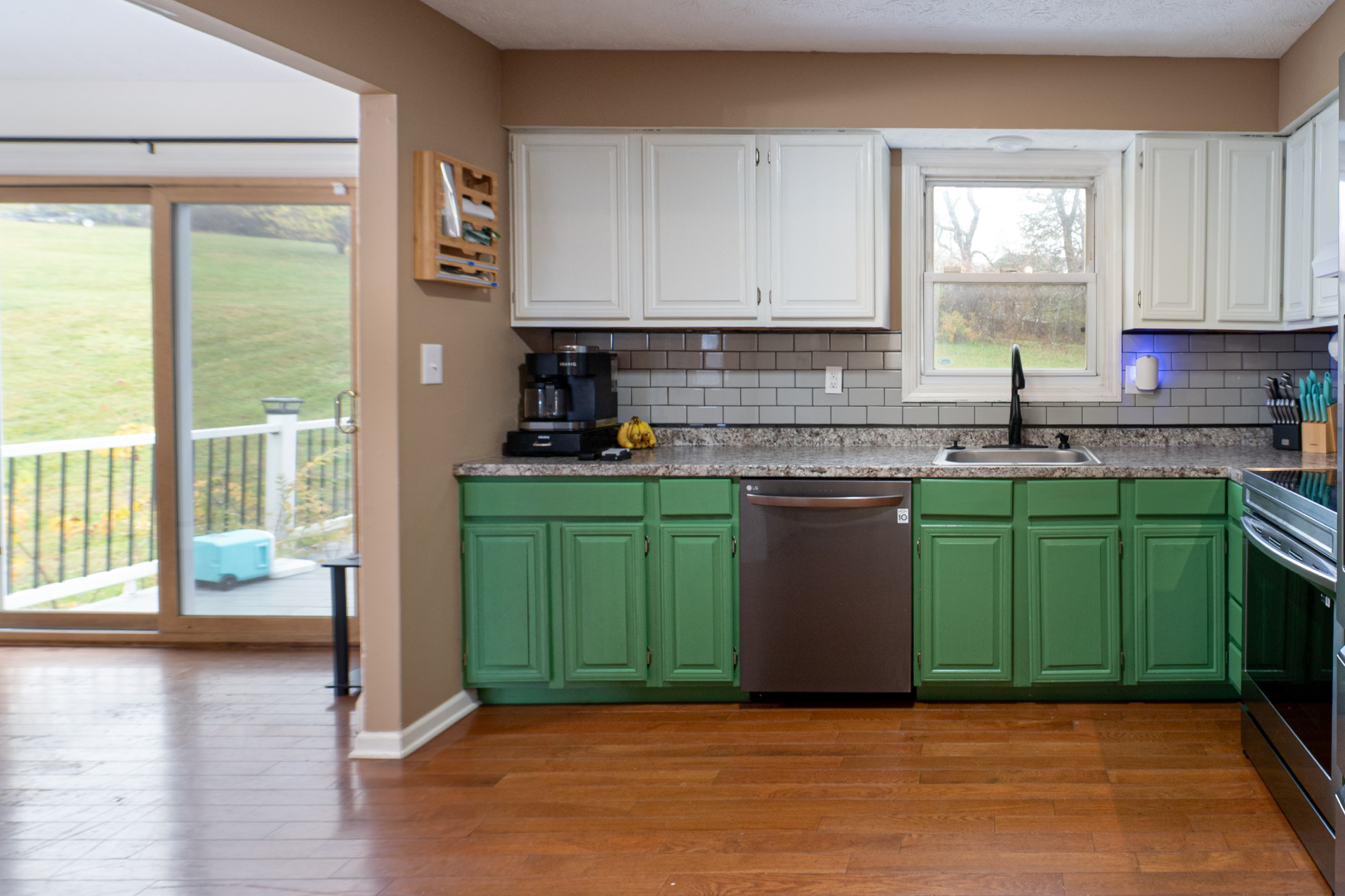 52 Cimarron Road Middletown, CT 06457 - Photo 11 of 31 a kitchen with a sink a window and cabinets