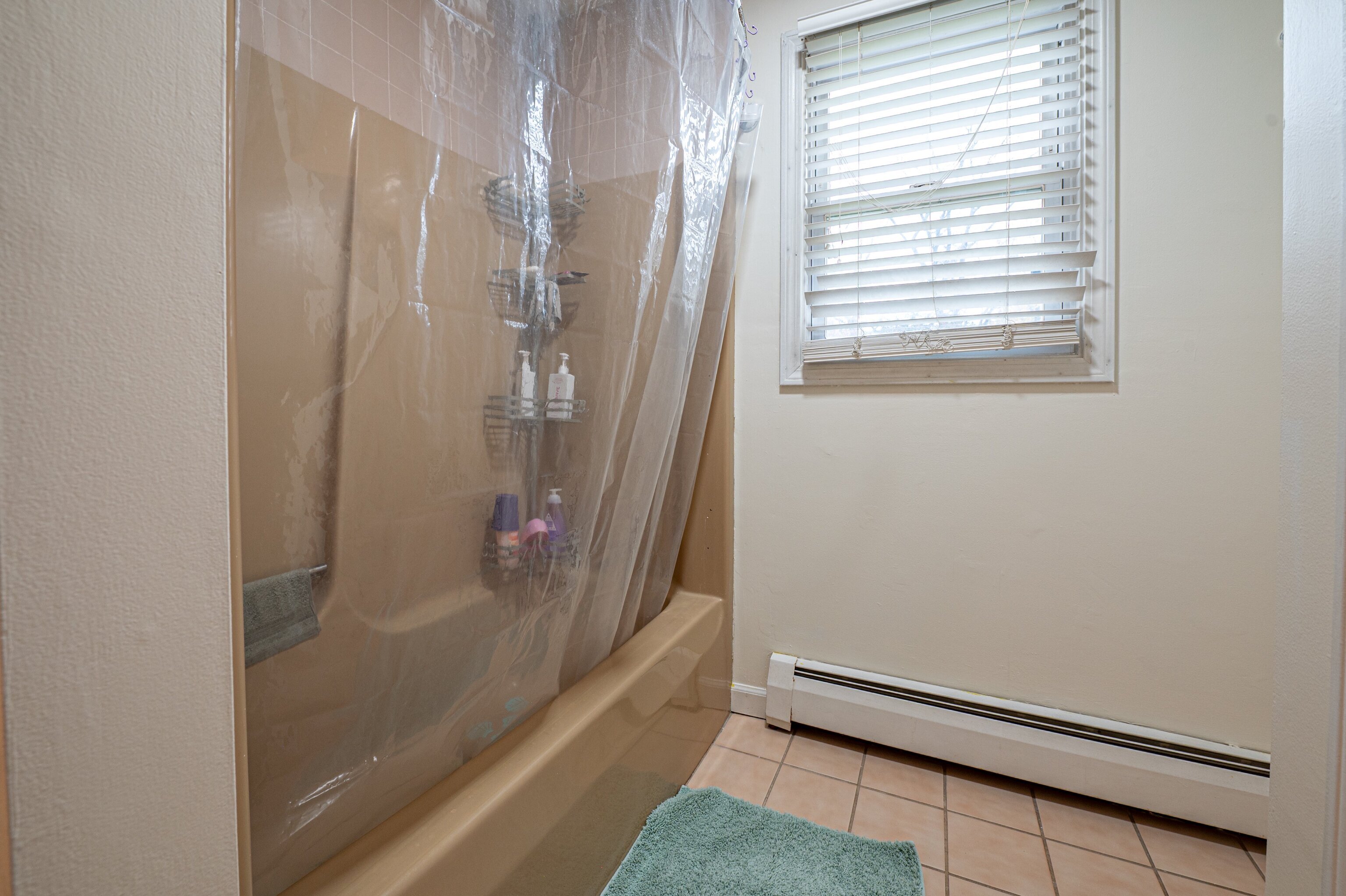 52 Cimarron Road Middletown, CT 06457 - Photo 16 of 31 a bathroom with a bathtub