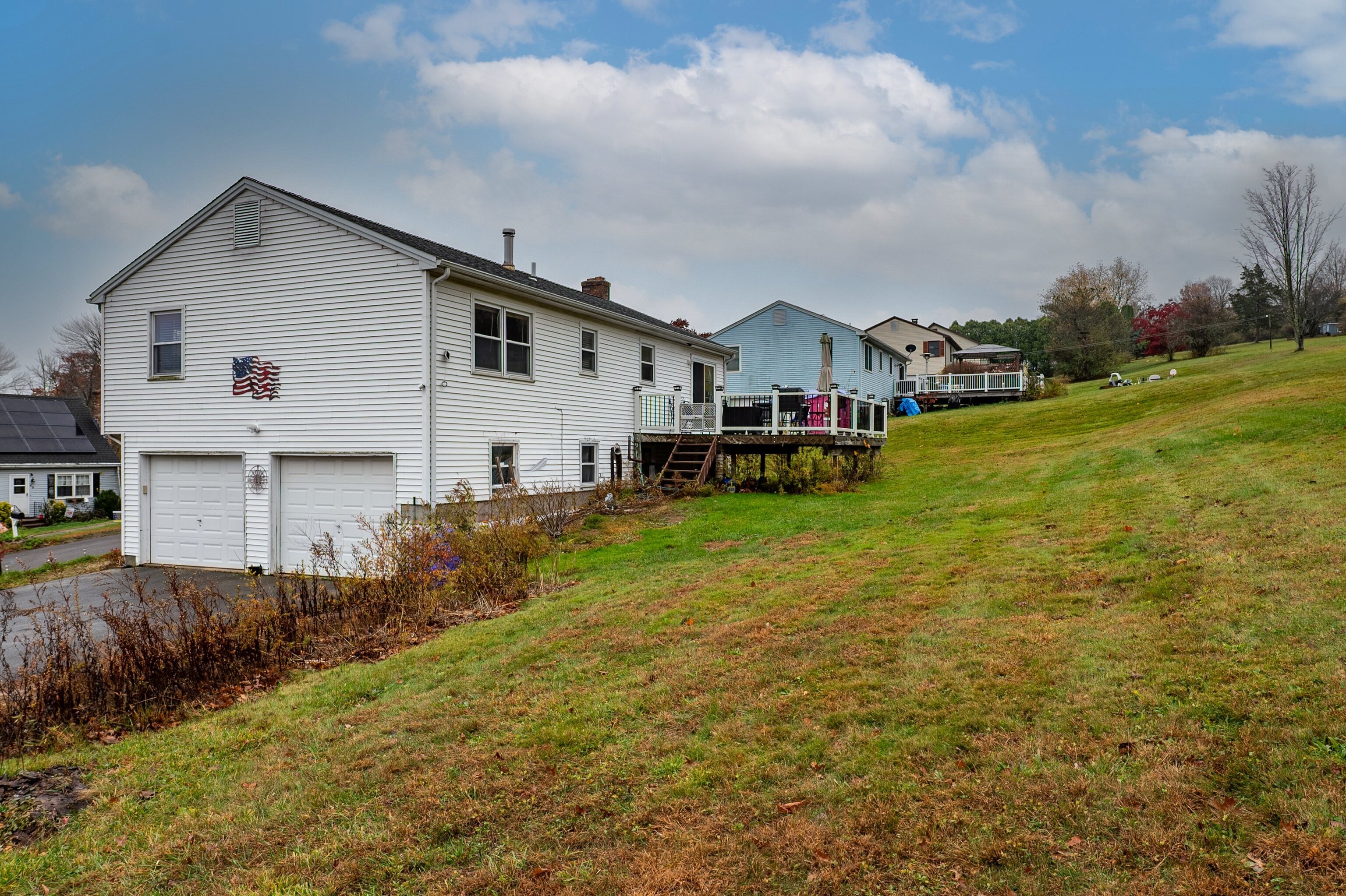 52 Cimarron Road Middletown, CT 06457 - Photo 26 of 31 a view of a house with a yard