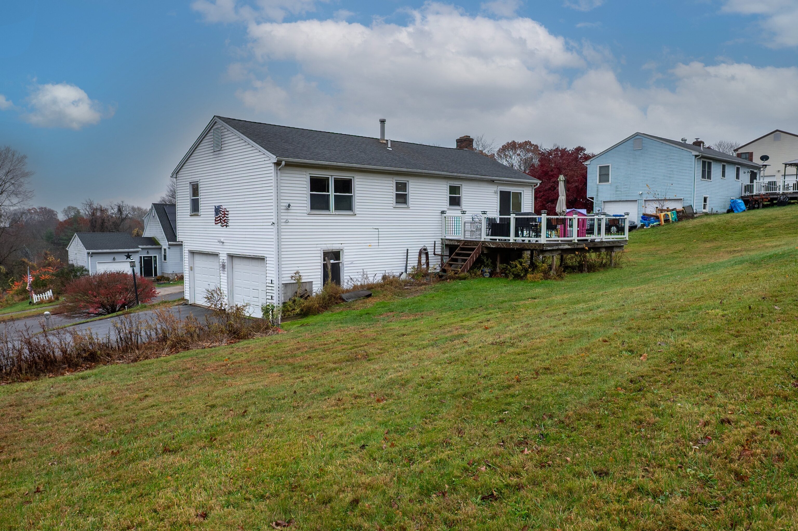 52 Cimarron Road Middletown, CT 06457 - Photo 27 of 31 a view of a house with a big yard and large trees