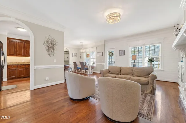 a spacious bedroom with a bed and a fireplace