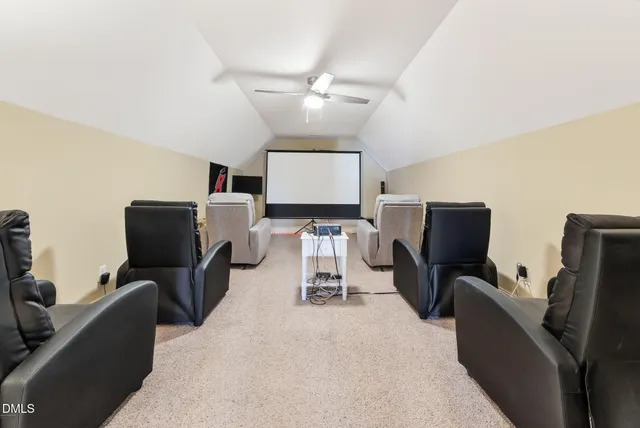 a view of an empty room with a fireplace