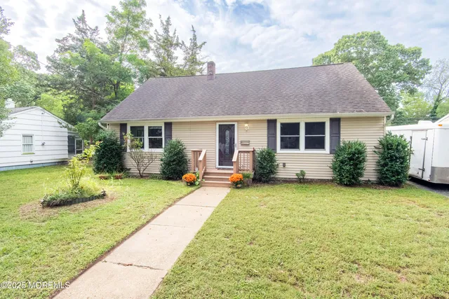 a view of a house with a garden