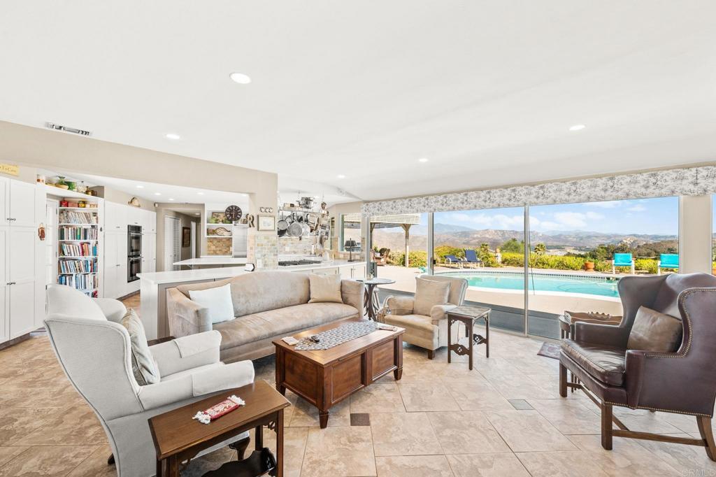 3730 Poppy Lane Fallbrook, CA 92028 - Photo 20 of 75 a living room with furniture and a large window