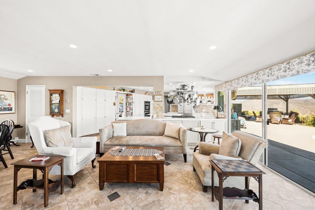3730 Poppy Lane Fallbrook, CA 92028 - Photo 33 of 75 a living room with furniture and a large window