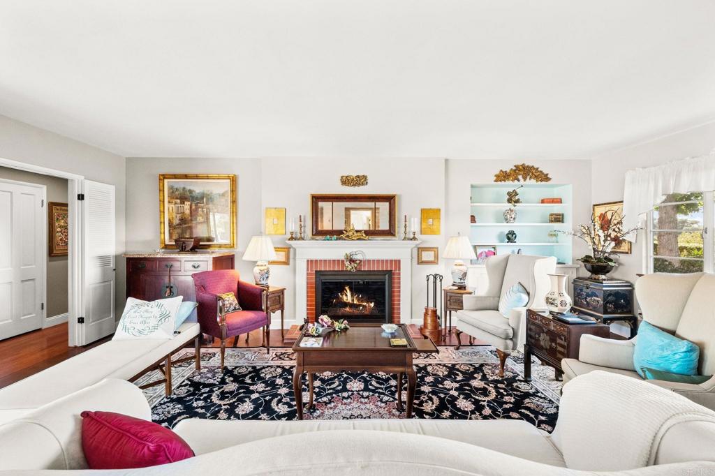 3730 Poppy Lane Fallbrook, CA 92028 - Photo 36 of 75 a living room with furniture fireplace and window