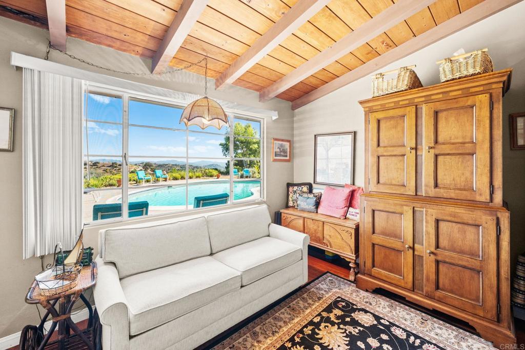 3730 Poppy Lane Fallbrook, CA 92028 - Photo 40 of 75 a living room with furniture and a window