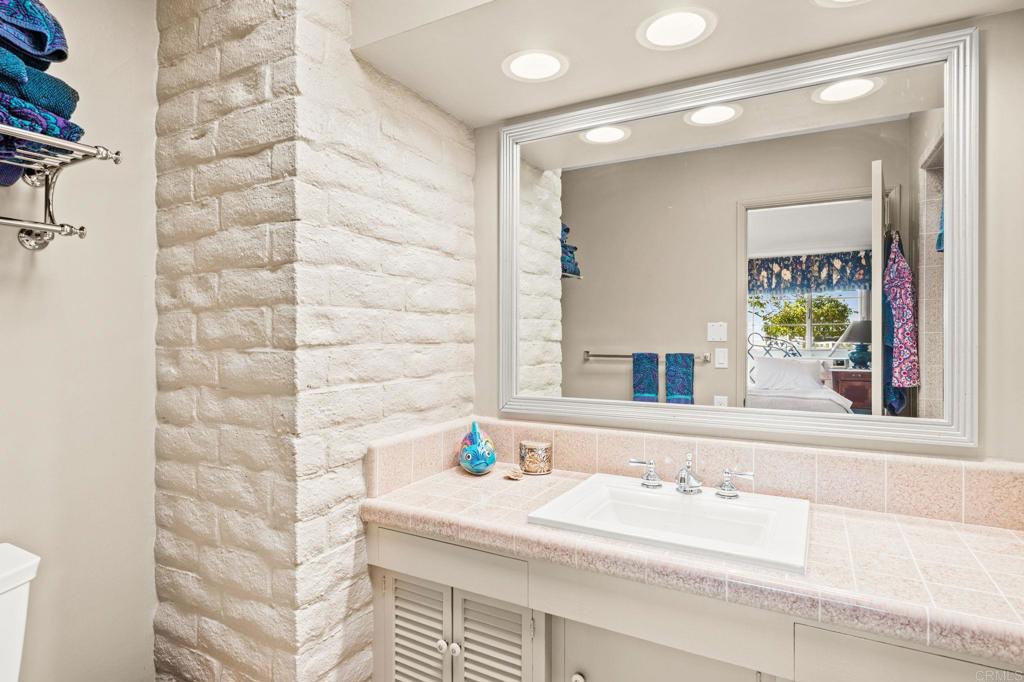 3730 Poppy Lane Fallbrook, CA 92028 - Photo 48 of 75 a bathroom with a sink and a mirror