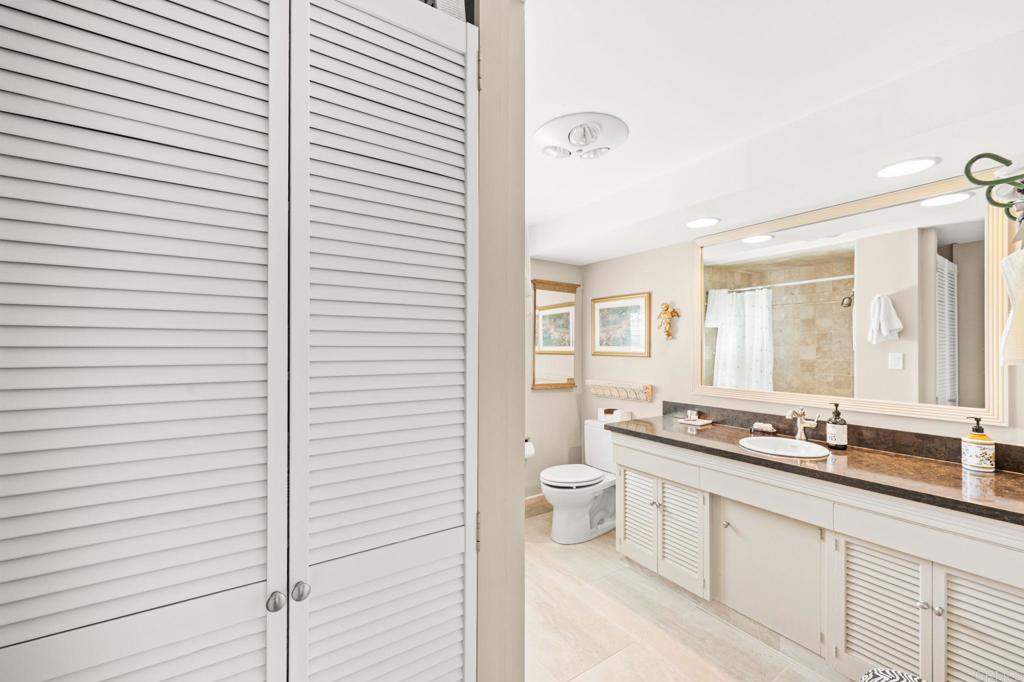 3730 Poppy Lane Fallbrook, CA 92028 - Photo 52 of 75 a bathroom with a toilet a sink and a mirror