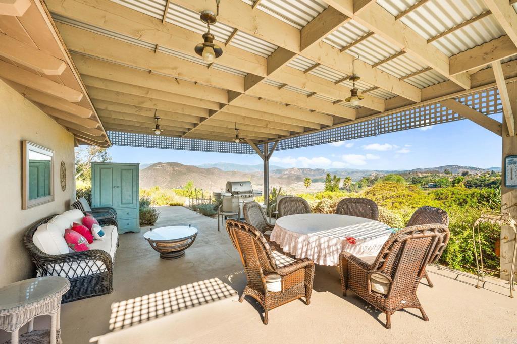 3730 Poppy Lane Fallbrook, CA 92028 - Photo 55 of 75 a view of a dining room with furniture one side kitchen view