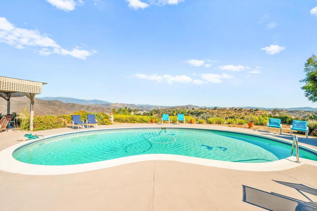 3730 Poppy Lane Fallbrook, CA 92028 - Photo 58 of 75 a view of a swimming pool with an ocean view