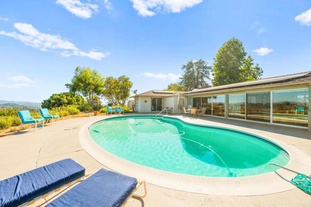 3730 Poppy Lane Fallbrook, CA 92028 - Photo 67 of 75 a view of a house with swimming pool and sitting area