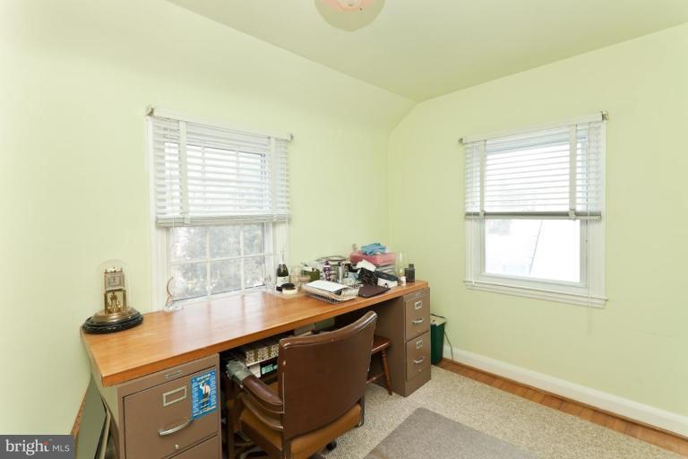 104 Cedarcroft Road Baltimore, MD 21212 - Photo 9 of 21 a table and a window in a room