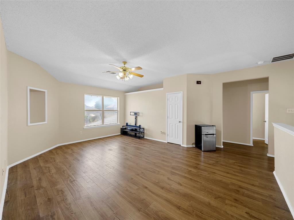 741 Aspen Court Allen, TX 75002 - Photo 33 of 40 Upstairs living room featuring dark wood-style floors, and ceiling fan