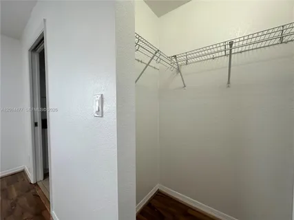 a view of small space with racks on the wall