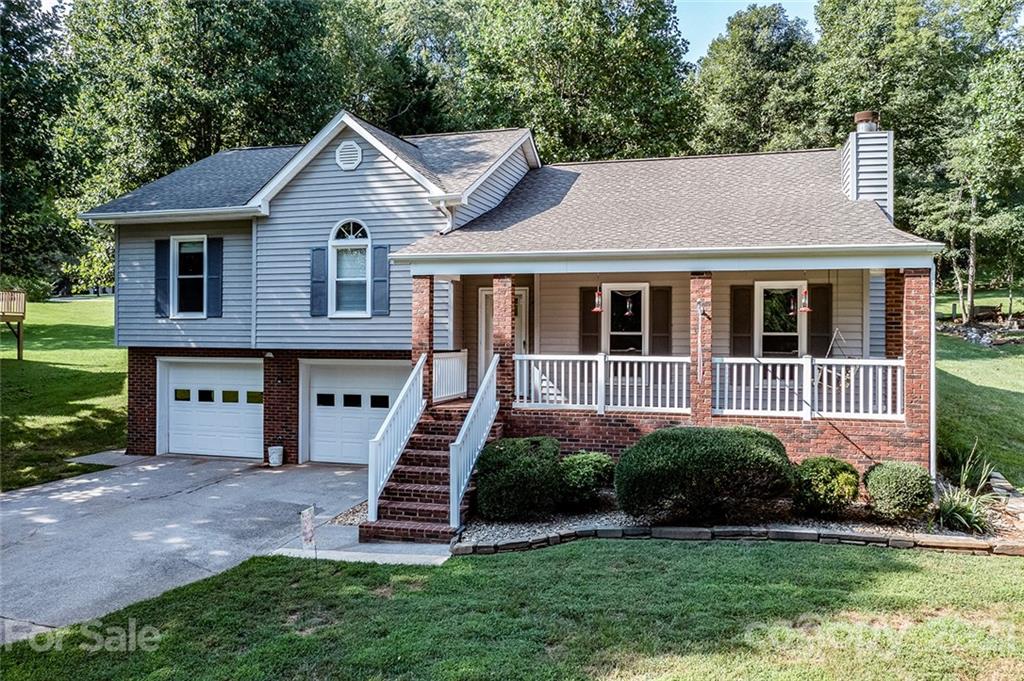 104 Rachel Street Morganton, NC 28655 - Photo 1 of 33 a front view of a house with a yard