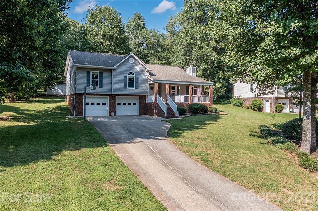104 Rachel Street Morganton, NC 28655 - Photo 3 of 33 a front view of a house with a yard