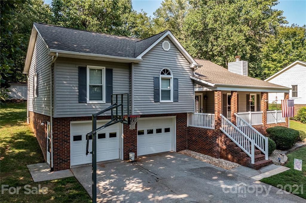 104 Rachel Street Morganton, NC 28655 - Photo 28 of 33 a view of a house with a yard and large tree