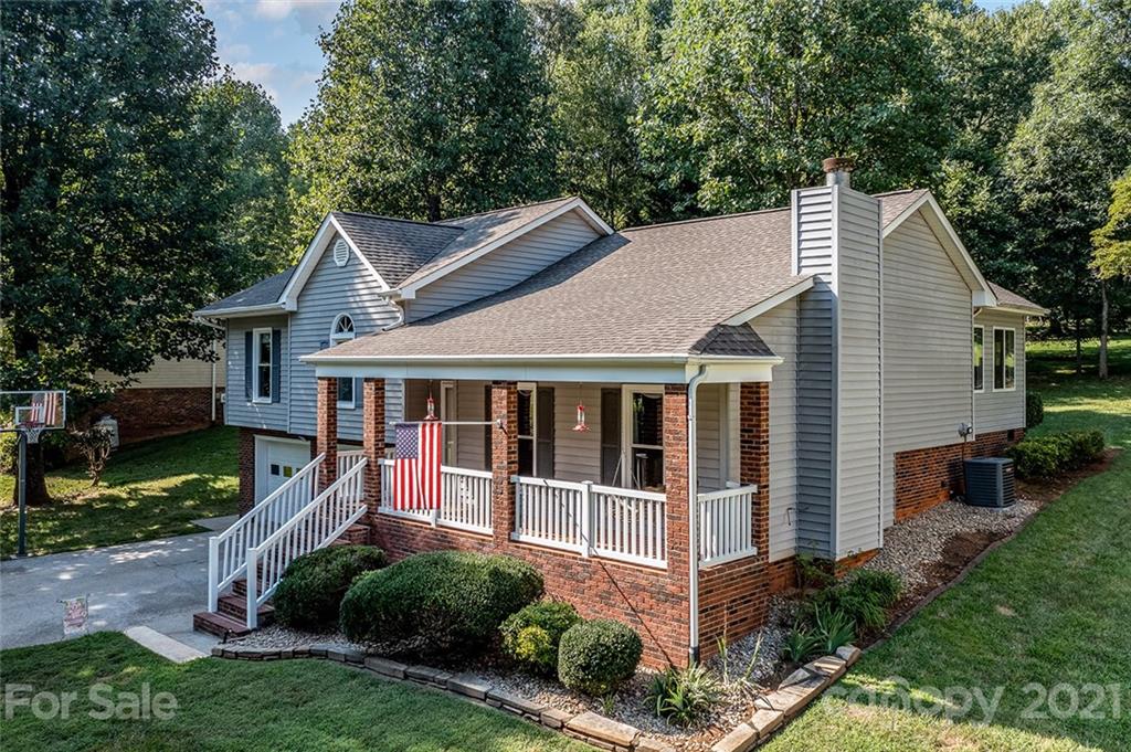104 Rachel Street Morganton, NC 28655 - Photo 4 of 33 a view of a house with a yard and plants