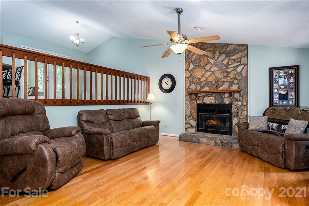 104 Rachel Street Morganton, NC 28655 - Photo 6 of 33 a living room with furniture and a fireplace