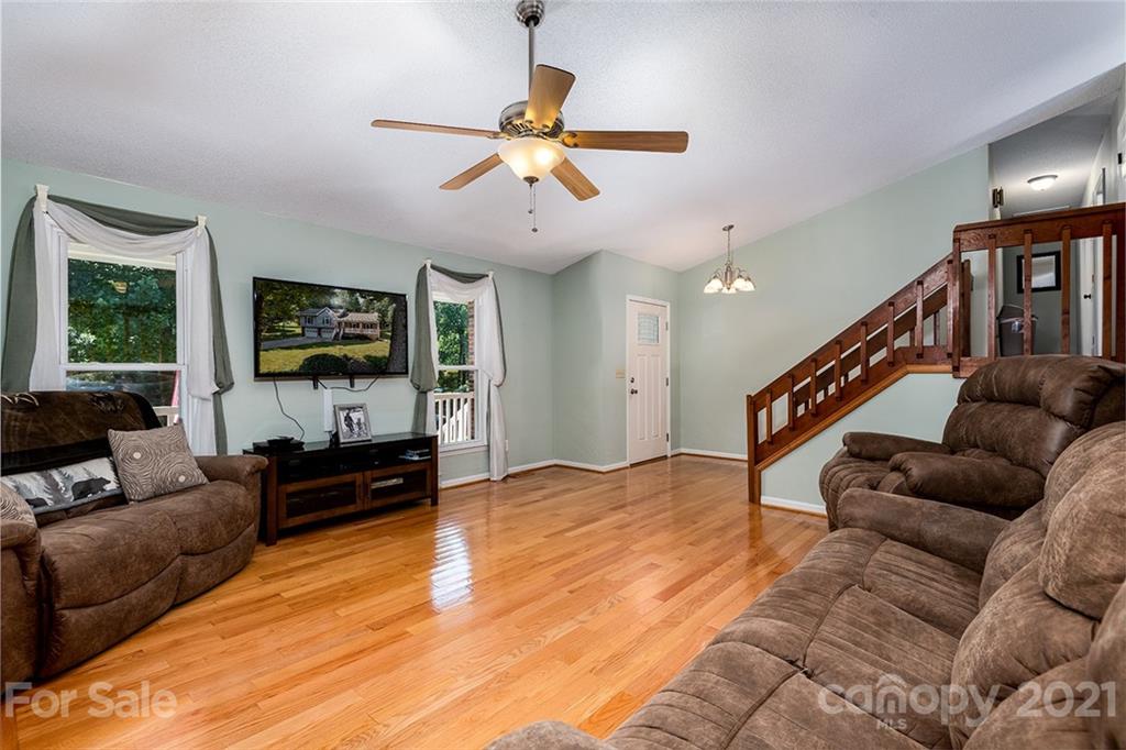 104 Rachel Street Morganton, NC 28655 - Photo 7 of 33 a living room with furniture flat screen tv and a window
